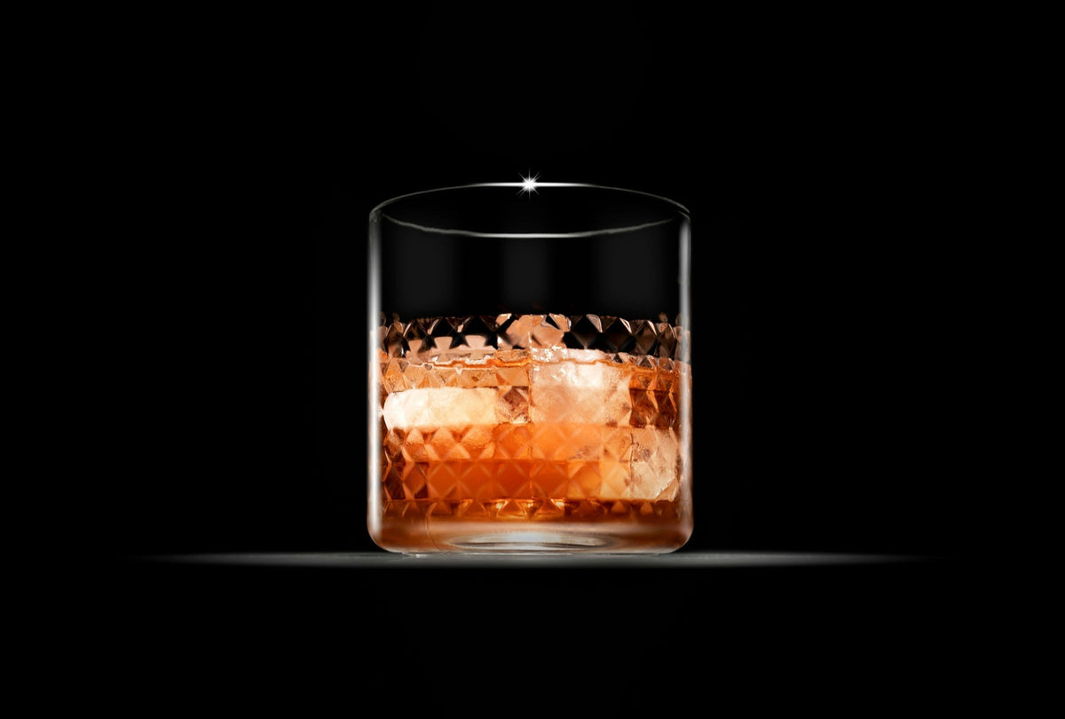 Glass of whiskey on ice