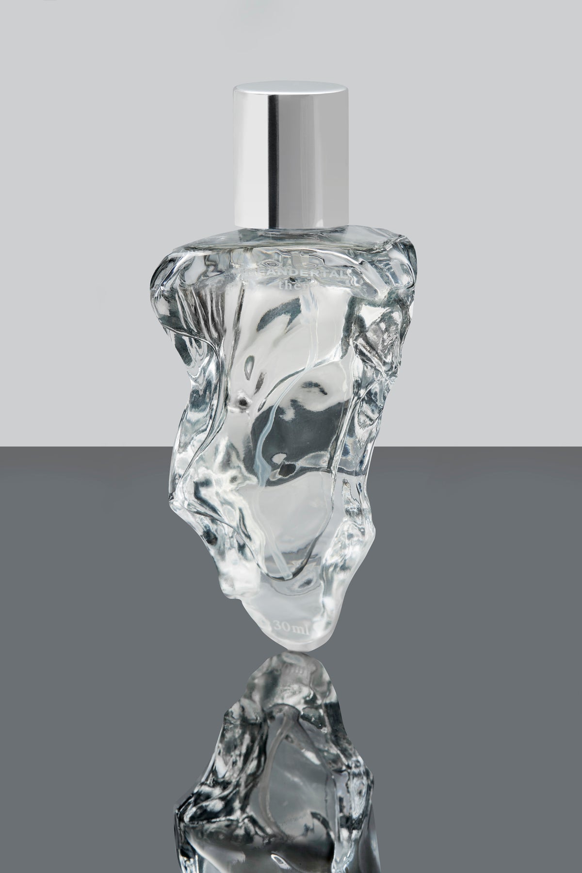 Neandertal Them Eau de Parfum 30ml, clear flint-shaped glass bottle