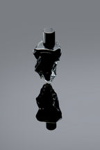 Neandertal Was and Is bottles, black and silver